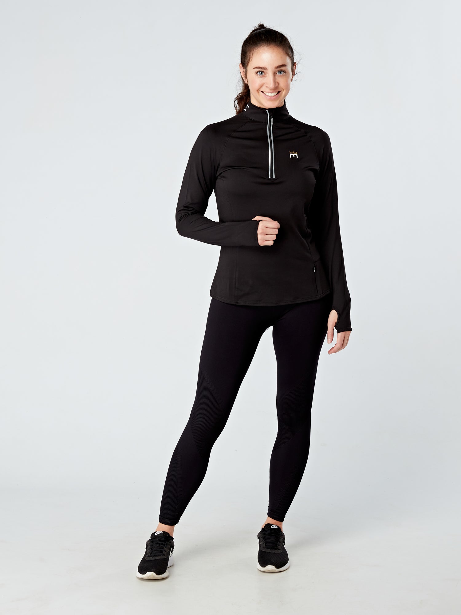 EVOLVE GOLD HALF ZIP LONG SLEEVED TOP - BLACK