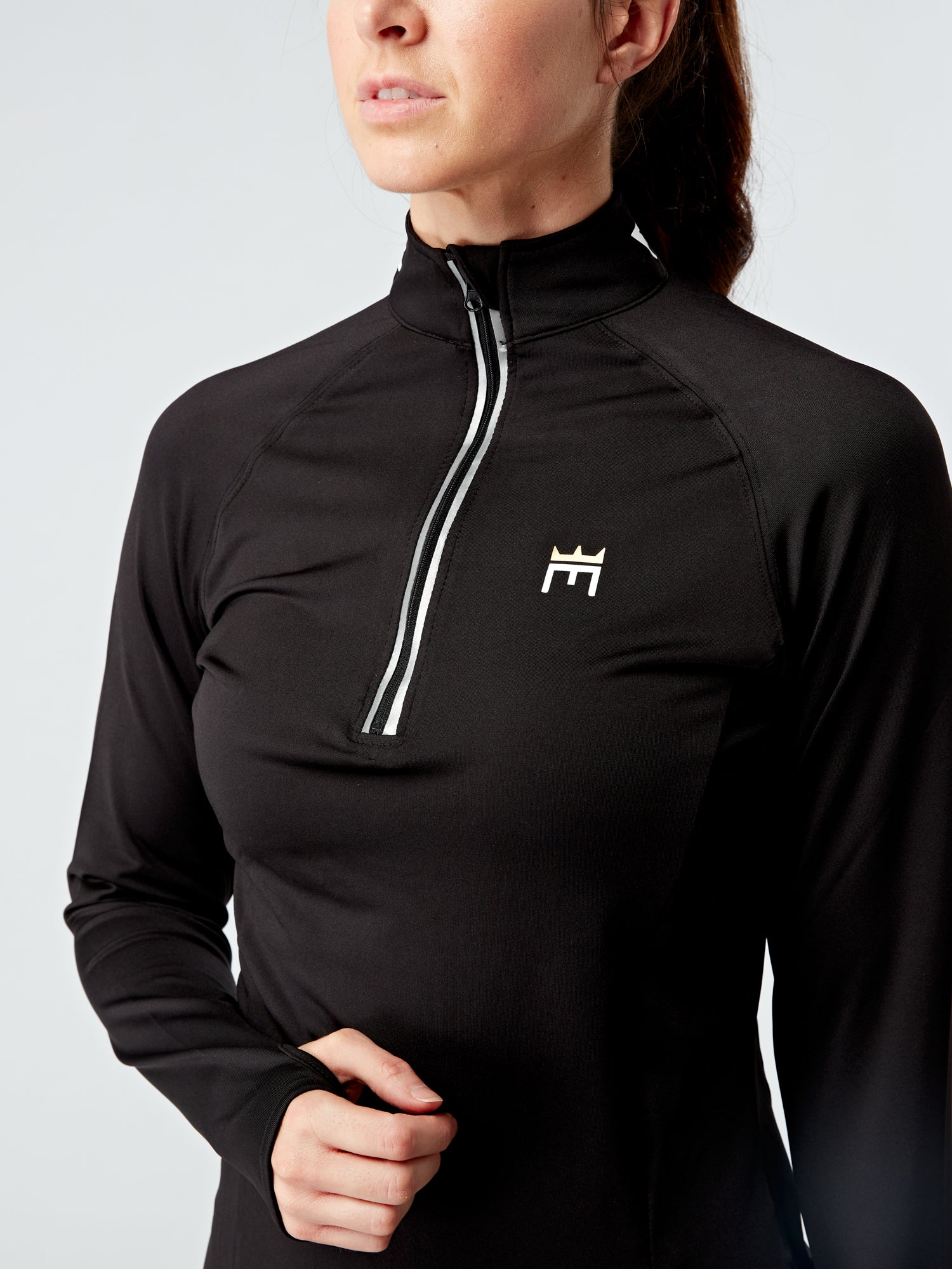 EVOLVE GOLD HALF ZIP LONG SLEEVED TOP - BLACK